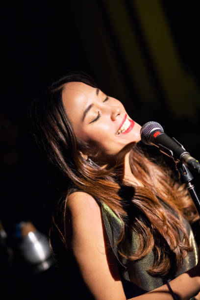 istock Happy singing thai jazz singer 1140150559
