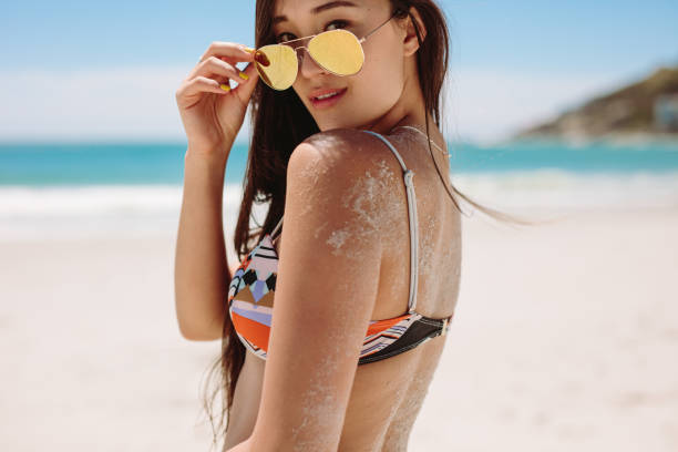 istock Young woman at the beach 1140150842