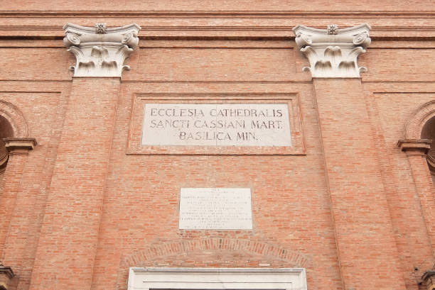 istock Facade of catholic church (Duomo di San Cassiano). 1140152247