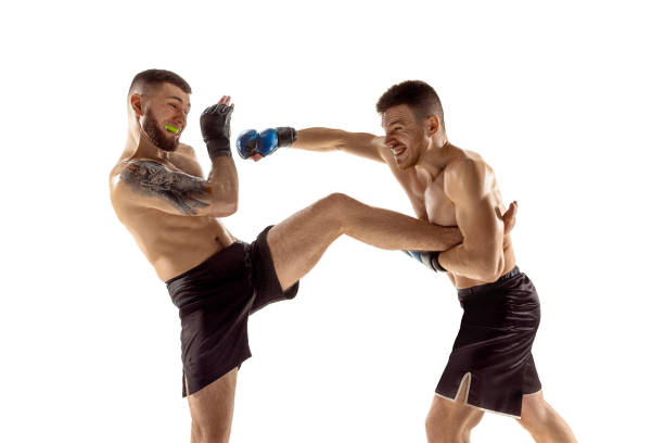istock Two professional boxers boxing isolated on white studio background 1140153116