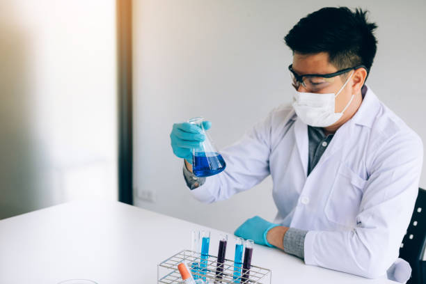 istock Scientist with equipment and science experiments in laboratory. 1140154514