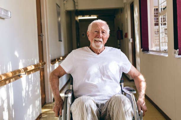 istock Senior male patient sitting in wheelchair 1140154607