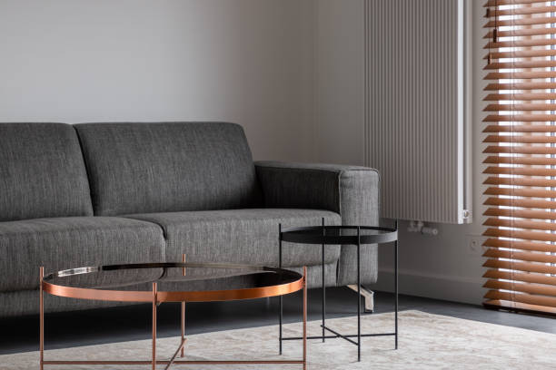 istock Gray couch and metal tables 1140159188