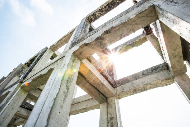 Bottom view, a lot of concrete square shape, sunbeam shining through precast box concrete.