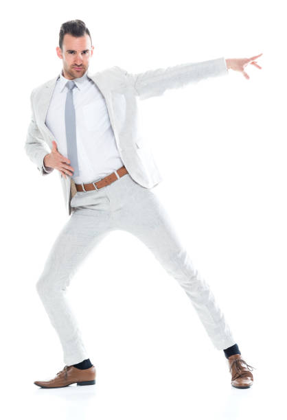 istock Handsome businessman is excited and dancing 1140162756