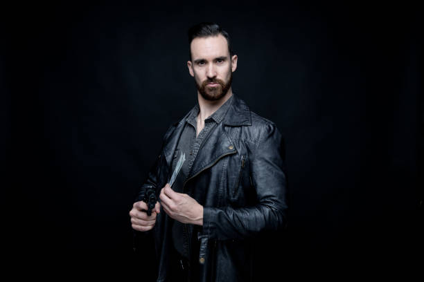 istock Man holding drugs and cash 1140163748