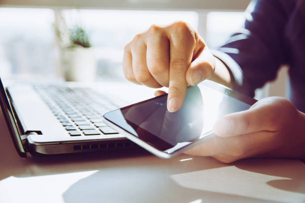 istock Female hands holding smart phone 1140165138