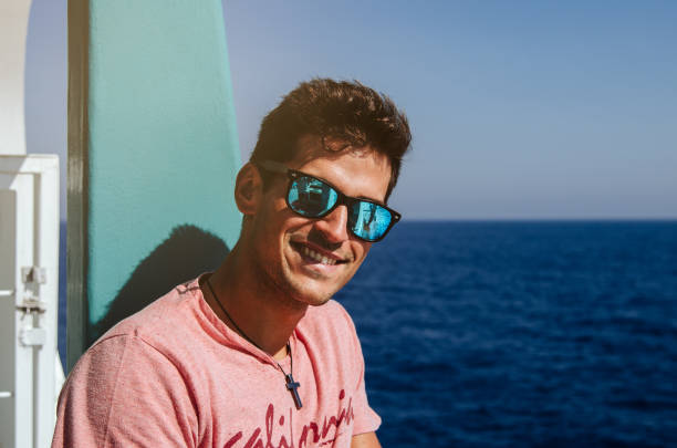 istock Man in a boat in the sea 1140167456