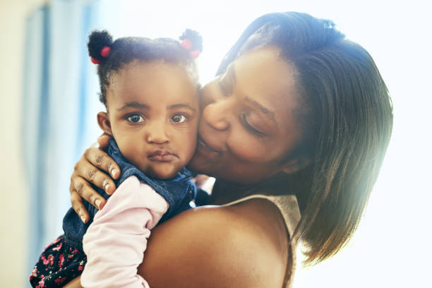 istock Mom always wants to eat my squishy cheeks 1140167717