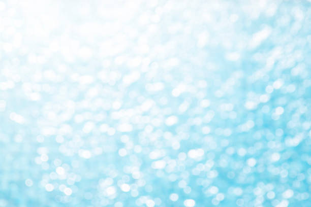 istock Abstract of bokeh lights on blue 1140168320
