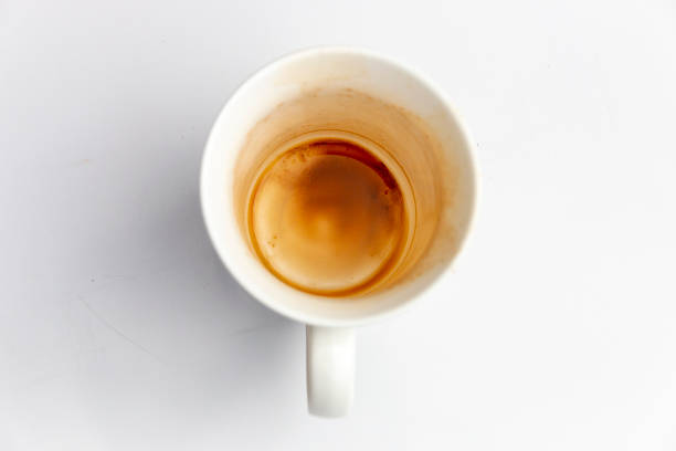 istock A Close up side view of three dirty white coffee mugs 1140169889