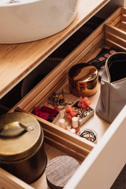 istock Bathroom washstand commode drawer storage with make up and jewelry 1140170106