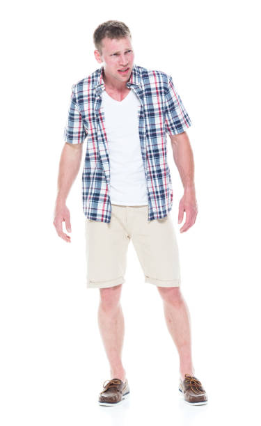 istock Handsome man in shirt and shorts is feeling confused 1140170499