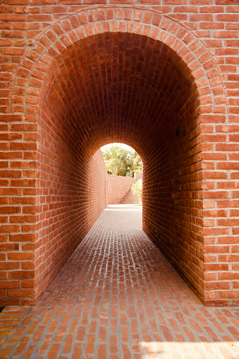 Red bricks made entrance gate unique photo