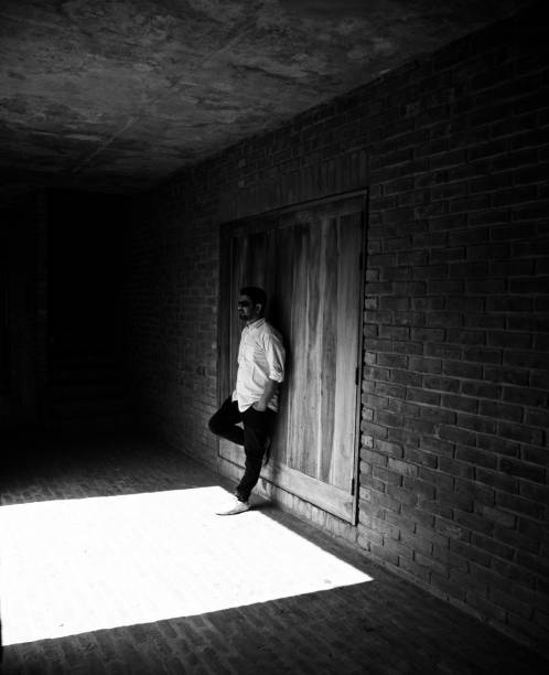 istock Man standing in a place wearing shirts unique 1140171874