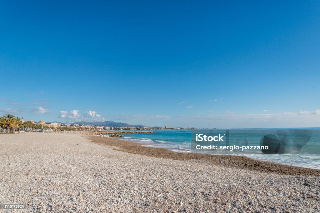 Seacoast of Cagnes-sur-Mer in a sunny winter day Cote d'Azur French Riviera is situated in the southern eastern part of the mediterranean coast of France and it is famous for its exclusive beaches and its beautiful sea Beach Stock Photo