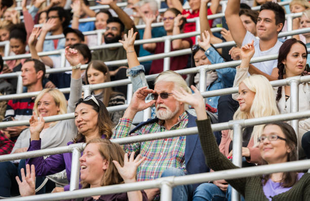 istock Sport Fans Cheering On Tribunes 1140177097
