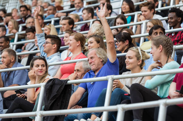 istock Sport Fans Cheering On Tribunes 1140177231