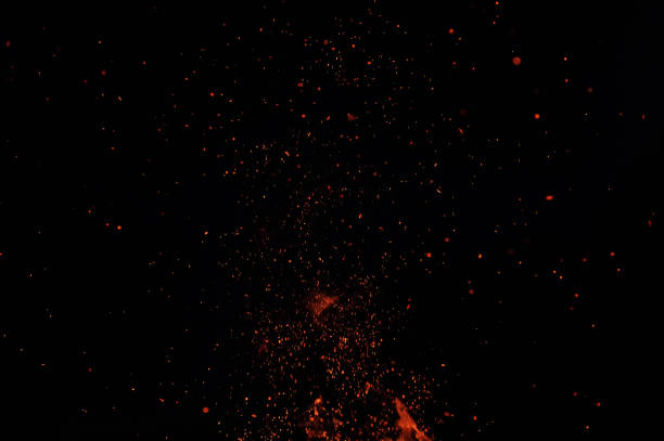 istock Abstraction, yellow small spots, sparks from a fire, on a black background. Defocused 1140179853