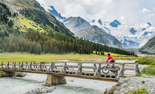 istock Mountainbiking in Engadine valley Switzerland 1140182422