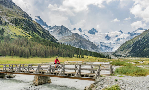 istock Mountainbiking in Engadine valley Switzerland 1140183570