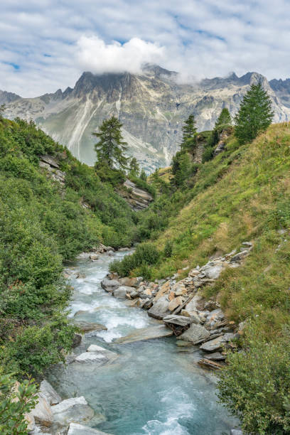 istock Mountainbiking in Engadine valley Switzerland 1140184604