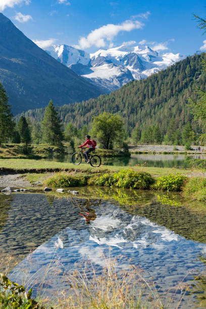 istock Mountainbiking in Engadine valley Switzerland 1140185822