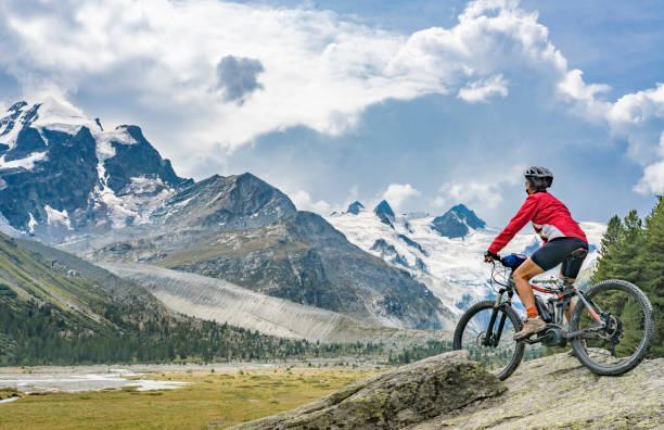 istock Mountainbiking in Engadine valley Switzerland 1140185863