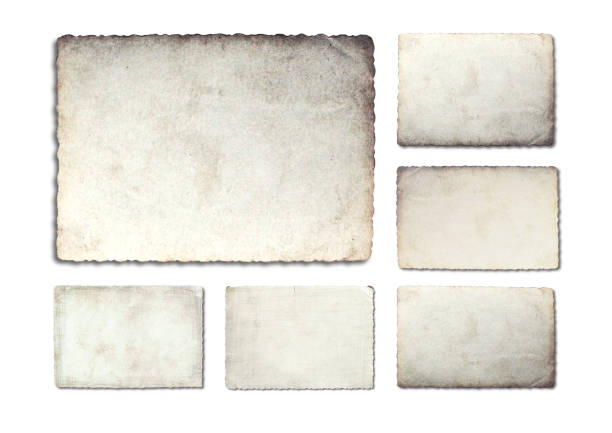 istock Old photo paper texture isolated on white background. 1140186598