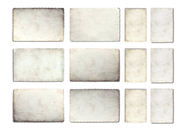 istock Old photo paper texture isolated on white background. 1140186616
