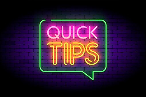 Quick tips, hint, helpful tricks in speech bubble with neon effect. Vector illustration on dark brick background.