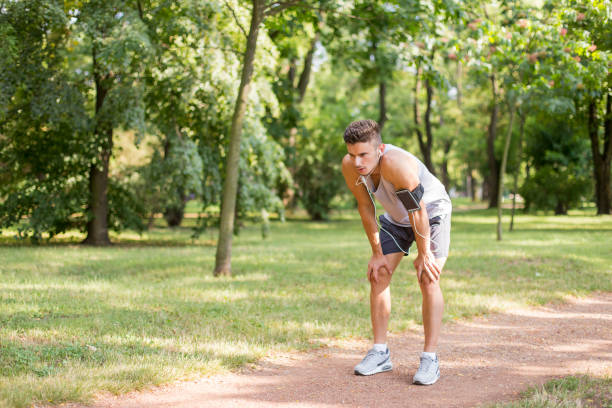 istock Portrait of man taking break from jogging 1140187507