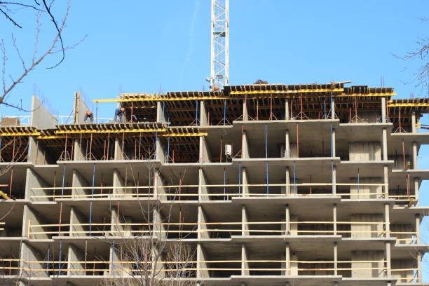 istock Lots of tower Construction site with cranes and building with blue sky background 1140192929