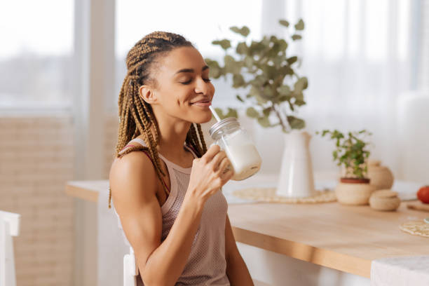 istock Woman after finishing workout drinking protein shake 1140193202