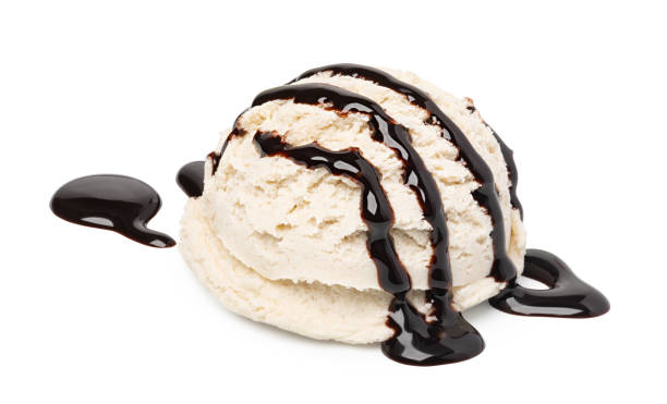 istock Vanilla ice cream scoop with chocolate sauce 1140198408