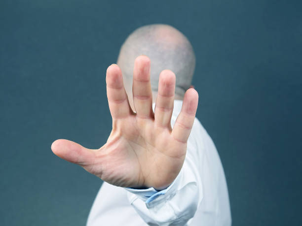 istock man negative hand gesture and turned away 1140199317