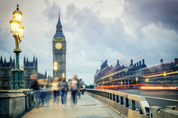 istock Incidental blurred people and car traffic on Westminster Bridge at twilight 1140200002