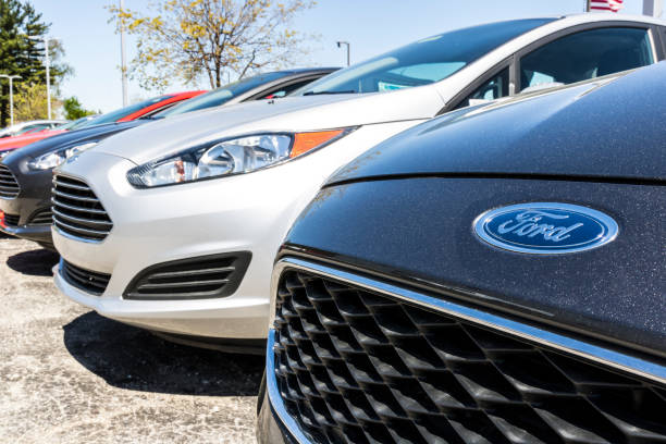 Local Ford Car and Truck Dealership. Ford sells products under the Lincoln and Motorcraft brands VI Indianapolis - Circa April 2017: Local Ford Car and Truck Dealership. Ford sells products under the Lincoln and Motorcraft brands VI letter f photos stock pictures, royalty-free photos & images