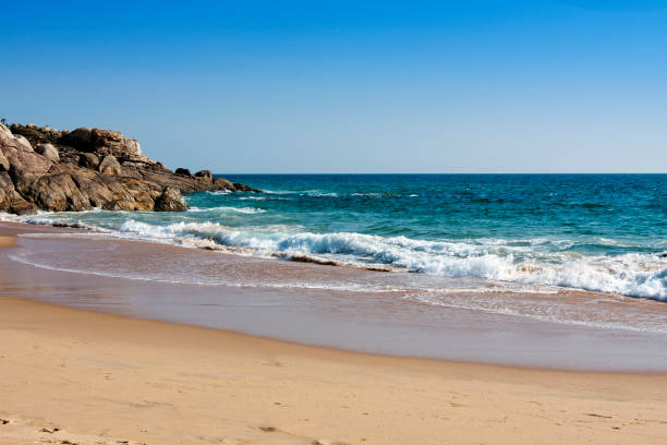 istock seashore with big stones. India. Kerala. 1140205518