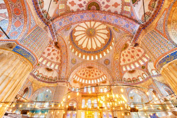Ornate interior of the landmark Blue Mosque in Istanbul, Turkey.