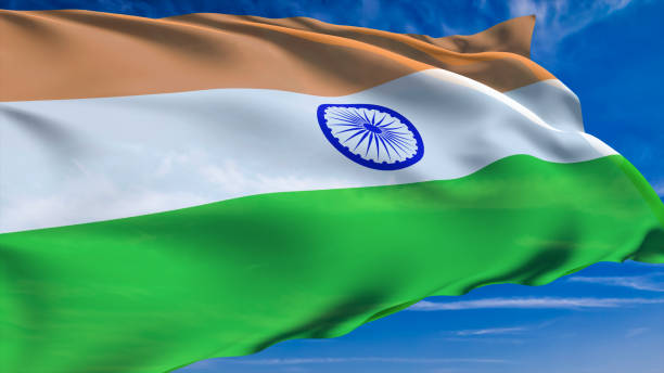 istock flag of India with fabric structure against a cloudy sky 1140210965