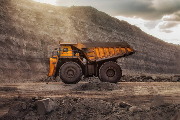 istock quarry dump truck at sunset 1140211142