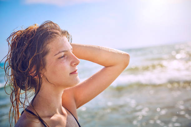 istock Happy Girl having fun on tropical beach 1140212206