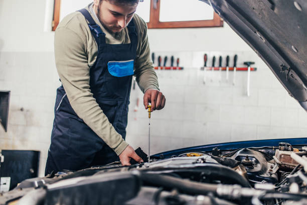 istock Auto mechanic working in garage 1140212650