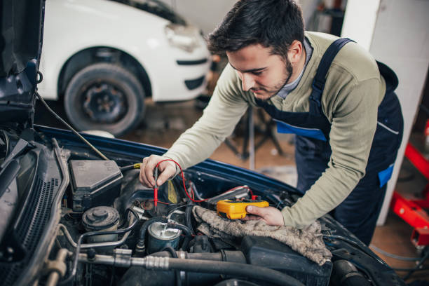 istock Auto mechanic working in garage 1140213539