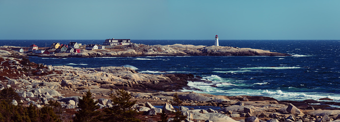 A distant view of Peggy's Cove Lighthouse.