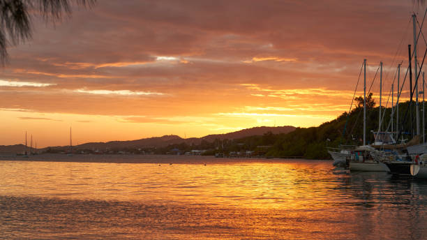 istock Sunset on tropical Roatan island 1140215175