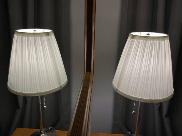 istock table lamp with lampshade on the table in front of a mirror 1140217037