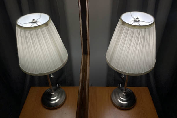 istock table lamp with lampshade on the table in front of a mirror 1140217057