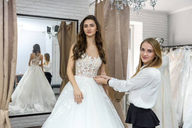istock Young and beautiful bride posing in wedding dress 1140218954